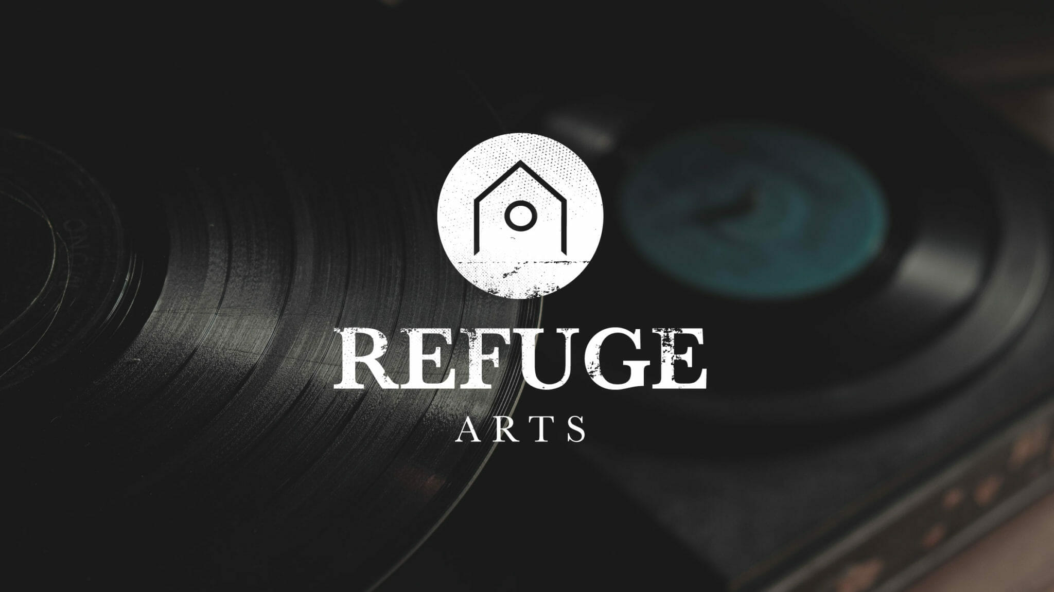 Refuge Arts concept against records.