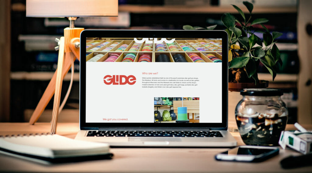 Glide Disc Golf Website on a laptop